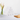 Elite white cotton towel set arranged in a hotel bathroom