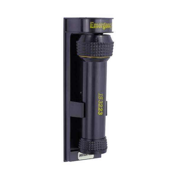 Wall mounted emergency torch in black sitting in its charging cradle